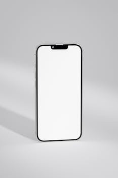 A close-up of a modern smartphone with a blank screen, ideal for mockups and design displays.